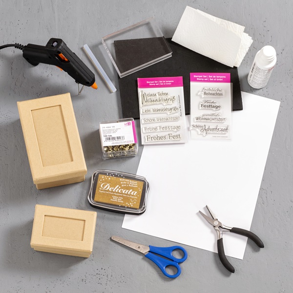 Material und Ergebnis: Geschenkverpackung mit Musterbeutelklammern