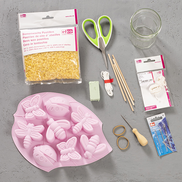Material und Ergebnis: Kerze „Biene“